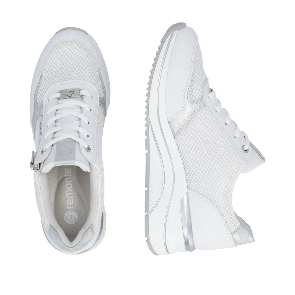 White leather women's trainers with zip and lace fastening, mesh panels, wide fit, and chunky soles.
