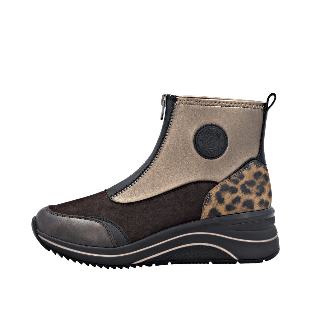 Remonte D0T78-90 women's wide-fit metallic vegan ankle boots with front zipper, leopard print heel detail, and chunky wedge sole.