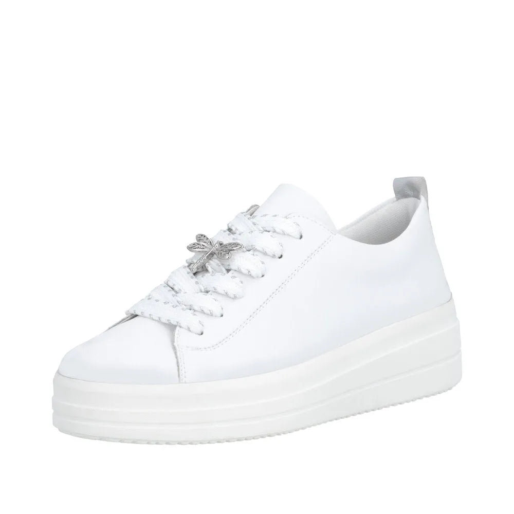 White leather lace-up women’s shoes with a chunky platform sole and a decorative dragonfly charm on the laces.