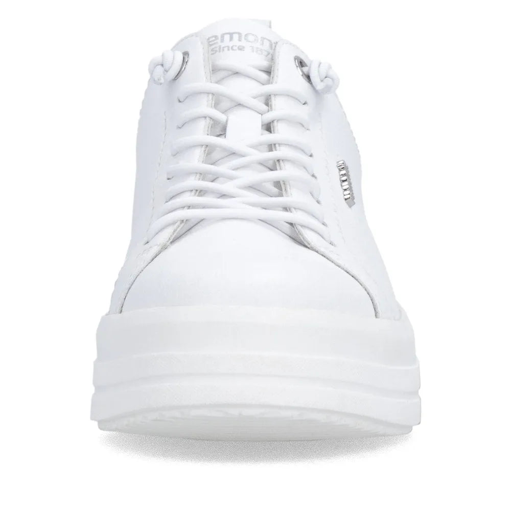 White leather lace-up platform shoes with chunky sole and silver brand detail, stylish and modern for women.