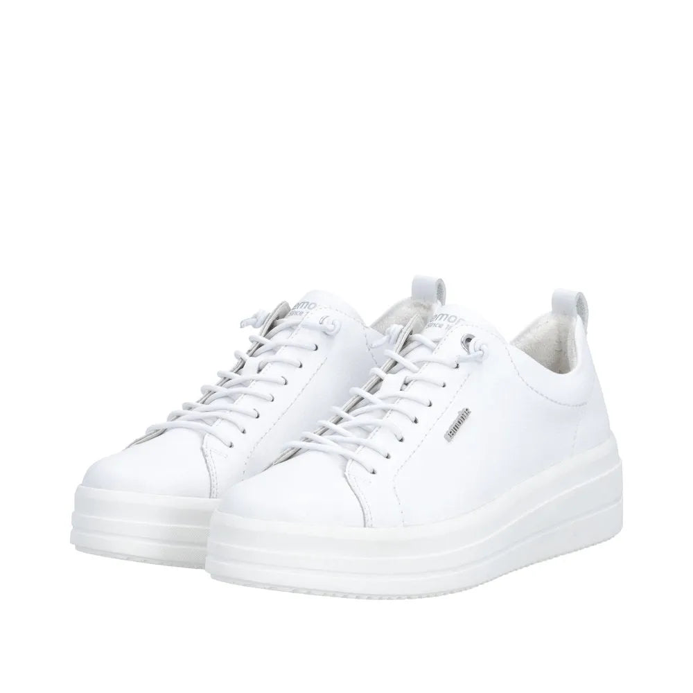 White leather lace-up sneakers with a chunky platform sole and slip-on heel tab.