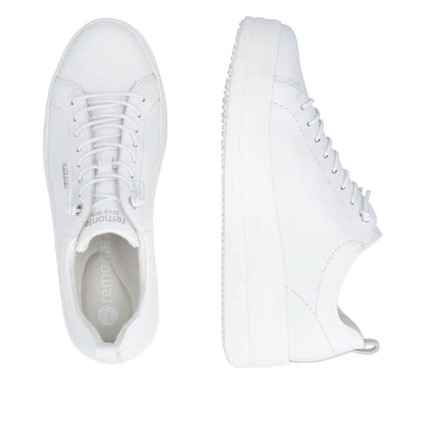 White leather lace-up sneakers with a chunky sole and minimal design for women.