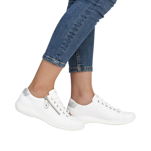 Remonte D1E03-80 women's wide white leather sneakers with zip and lace closure, silver accents, and comfortable flat sole.