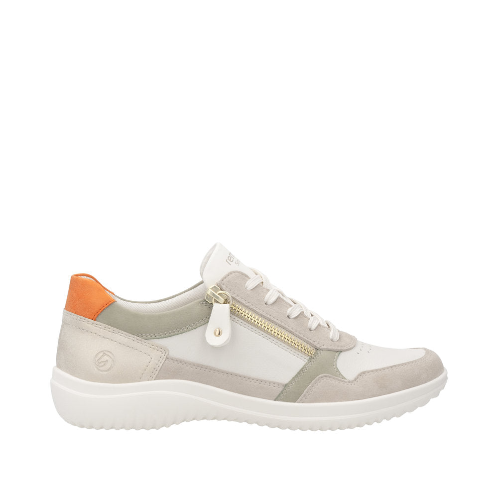 Remonte D1E06-80 women's wide white leather trainers with zip and lace-up closure, beige accents, and orange heel detail.