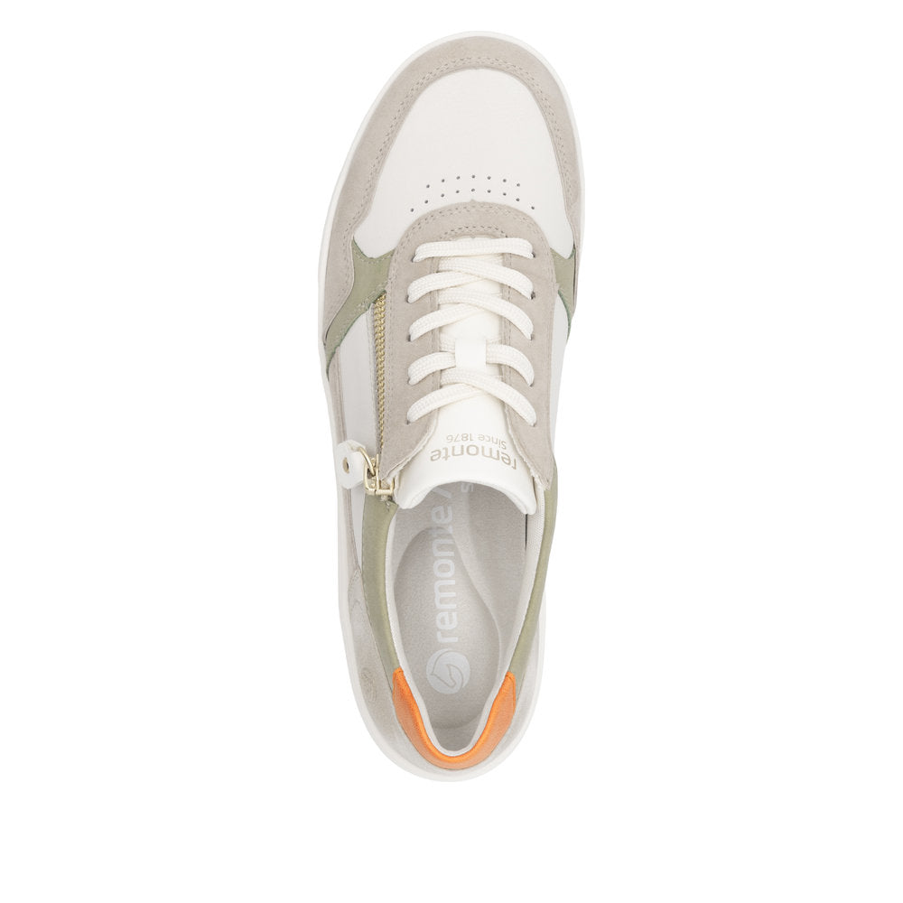 Remonte D1E06-80 women's wide white leather trainers with zip and lace-up closure, rubber sole, and orange accent detail.