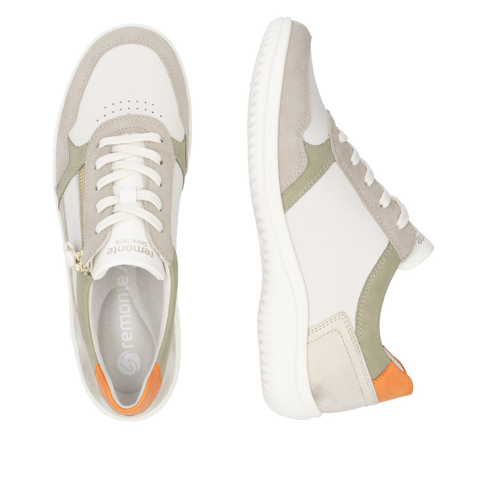 Remonte D1E06-80 women's wide white leather trainers with zip and lace-up design, beige and orange accents, and cushioned sole.