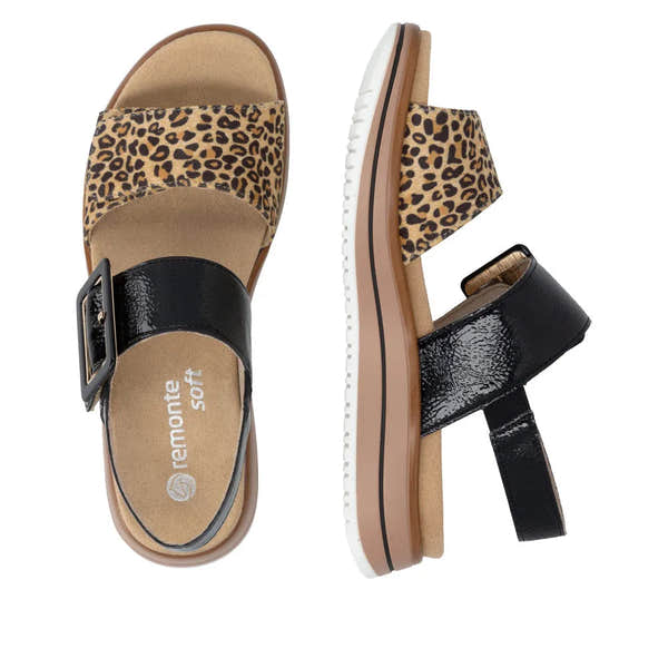Ladies black and animal print leather touch fastening sandals with buckle strap, comfort sole, and chunky sole design.