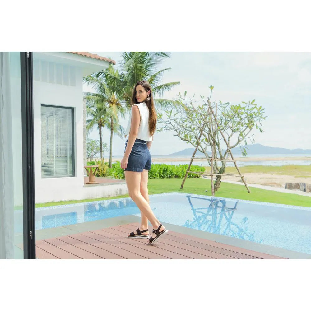 Remonte D1J62-25 Ladies Havanna Brown Suede Touch Fastening Sandals on woman by poolside in tropical setting.