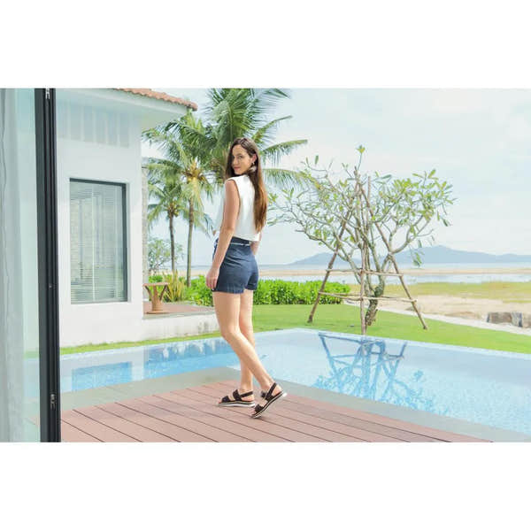 Remonte D1J62-25 Ladies Havanna Brown Suede Touch Fastening Sandals on woman by poolside in tropical setting.