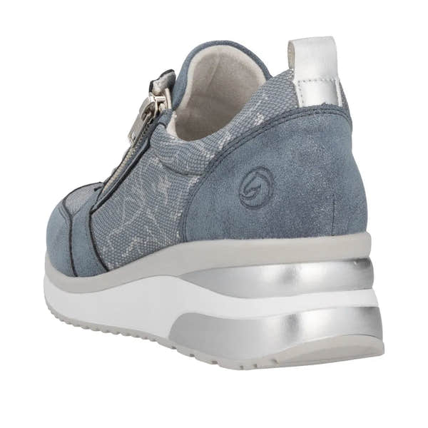 Blue textile ladies' sneakers with side zipper, white sole, metallic accents, and a pull tab at the heel.