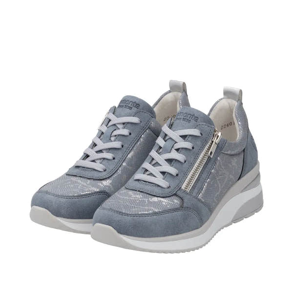 Blue textile wedge sneakers with side zipper, laces, and textured accents.