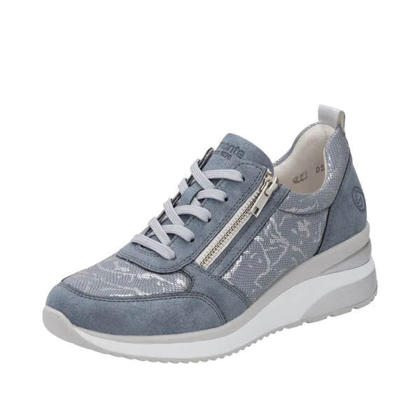 Blue textile ladies' sneaker with side zipper, lace-up front, cushioned white sole, and subtle floral pattern details.