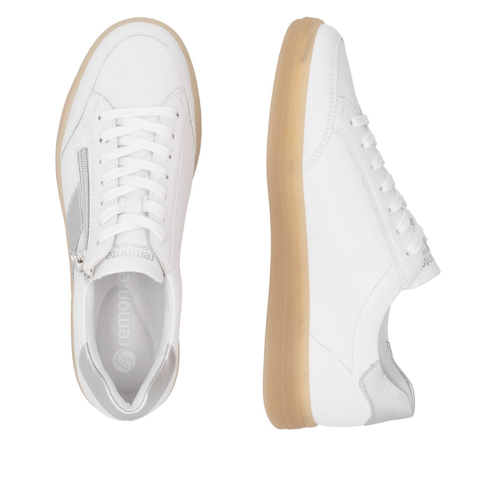 Remonte D2C02-80 women's wide white and silver leather sneakers with zipper and lace-up design, cushioned sole, and stylish casual footwear.