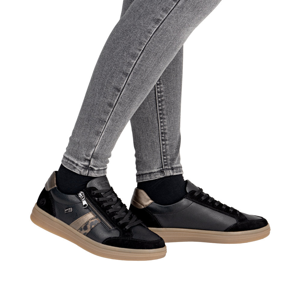 Remonte D2C04-03 women's wide fit black leather water-resistant trainers with zip and lace-up design, featuring beige accents and rubber soles.