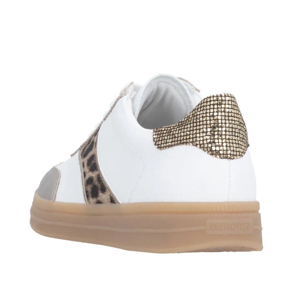 Wide white trainers featuring leopard print accents and a sparkling gold back, with a cushioned sole for comfort.