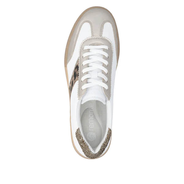 White lace-up trainers with leopard print and taupe accents; features a textured sole and cushioned insole for comfort.