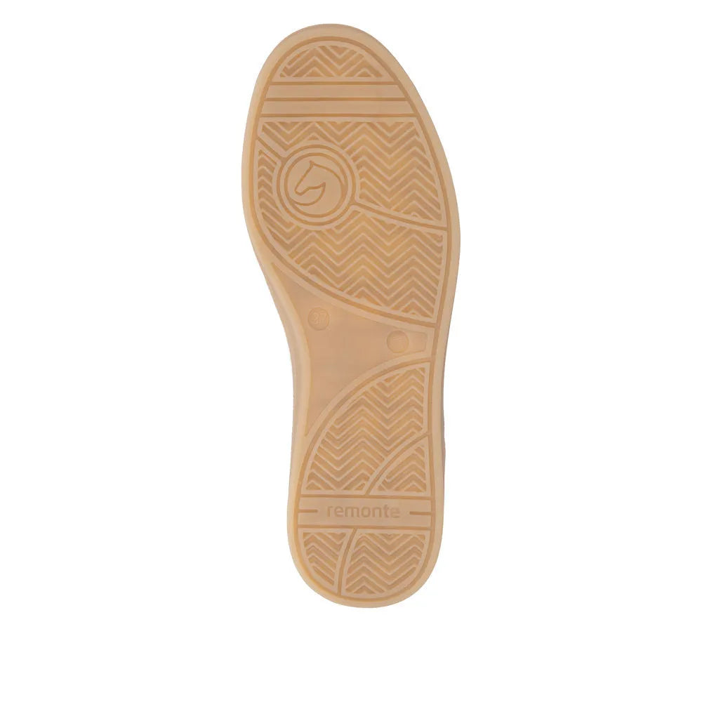 Sole of Remonte D2C05-80 ladies' trainers, featuring a rubber surface with a herringbone pattern in light brown.