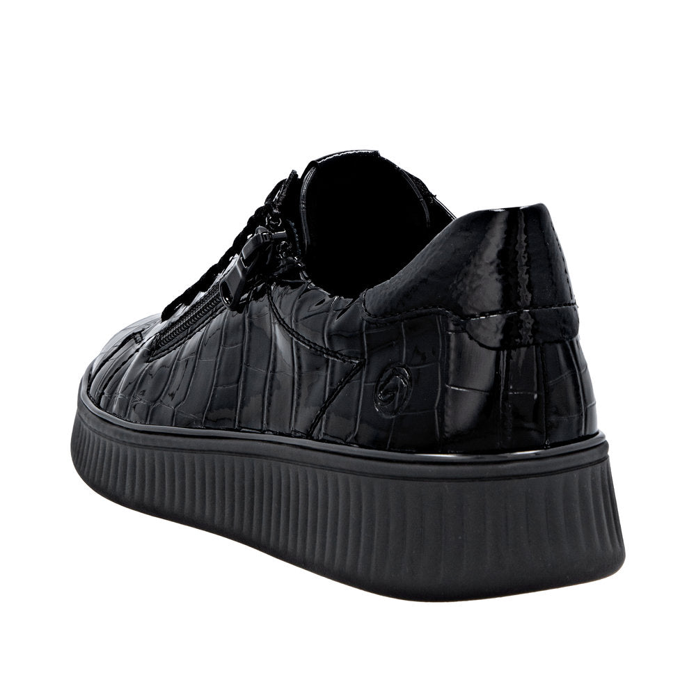 Remonte D2E01-00 women's black wide-fit sneakers with zipper and lace, featuring glossy faux crocodile texture and chunky sole.