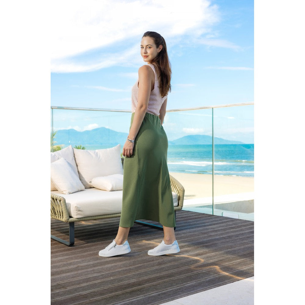 Remonte D2E01-80 women's wide white leather trainers with zip and lace, casual footwear, outdoor setting with ocean view.