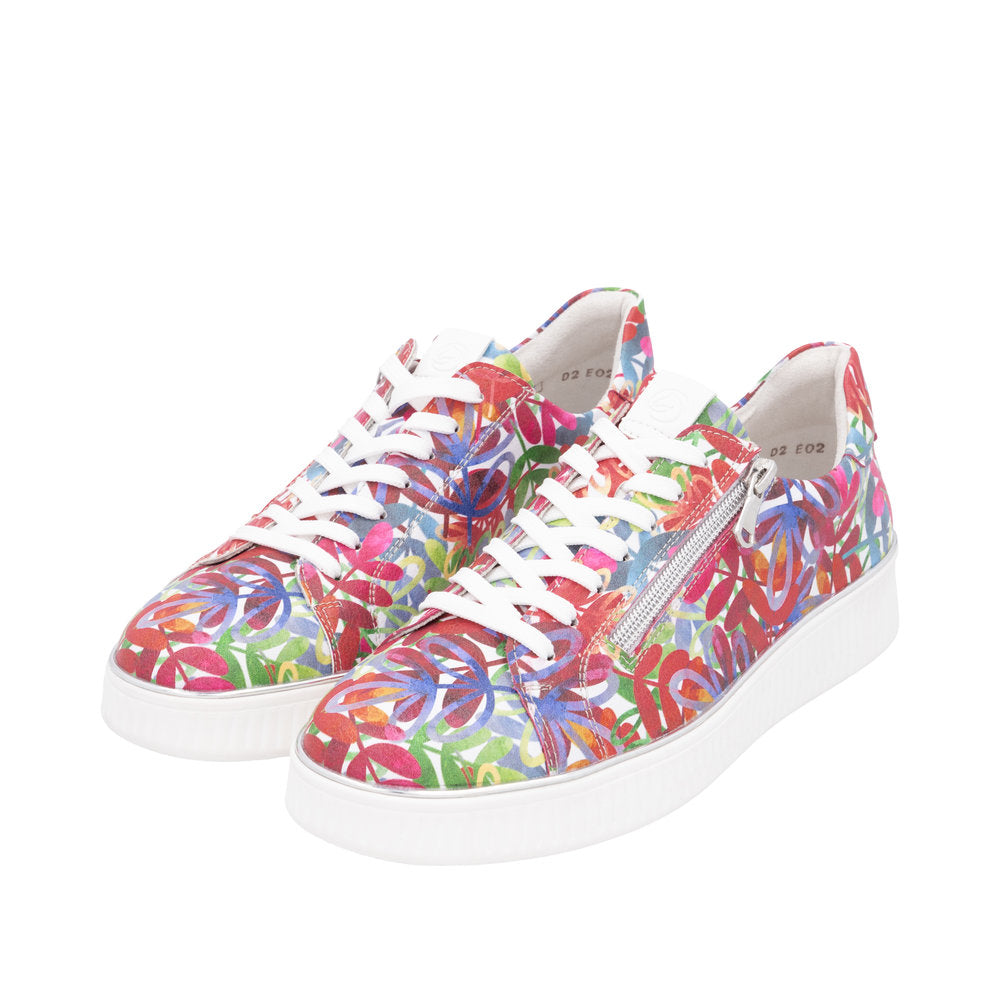 Ladies wide-fit floral leather sneakers with zippers and laces, featuring a colorful leaf pattern and white rubber soles.