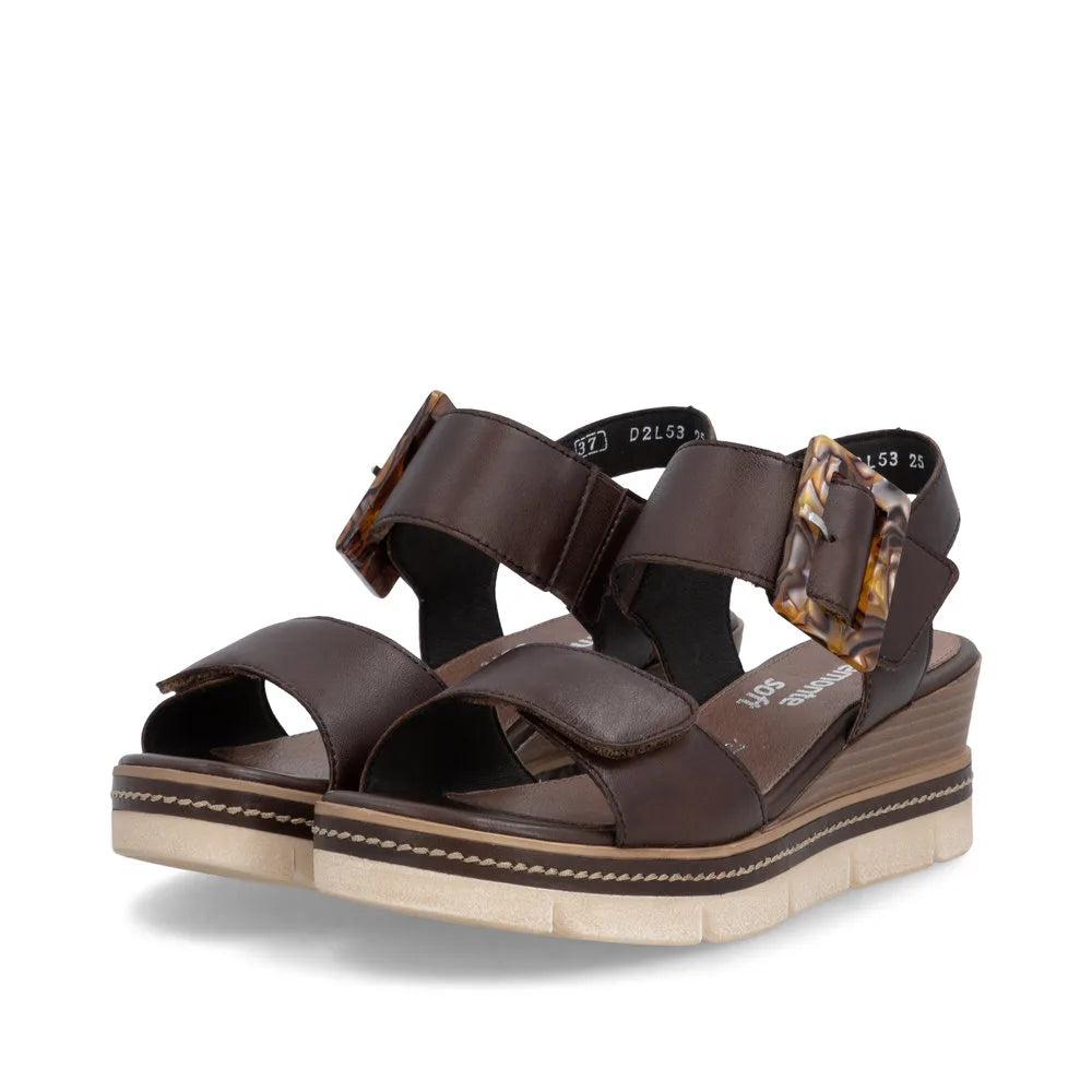 Remonte D2L53-25 women's dark brown leather sandals with touch fastenings, chunky wedge sole, and decorative buckle.