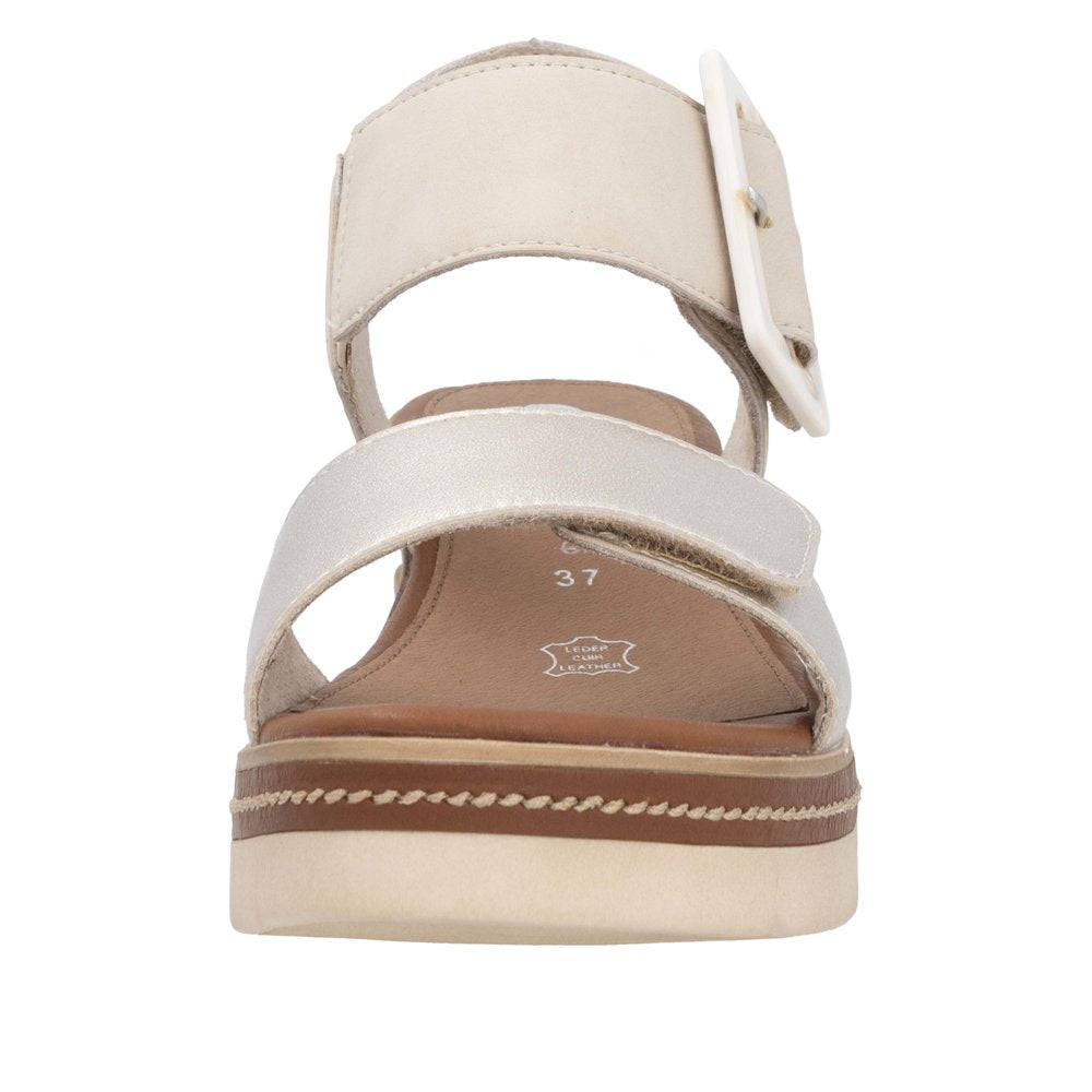 Remonte D2L53-60 feminine pale gold leather touch fastening sandals with buckle strap, cushioned footbed, and platform sole.