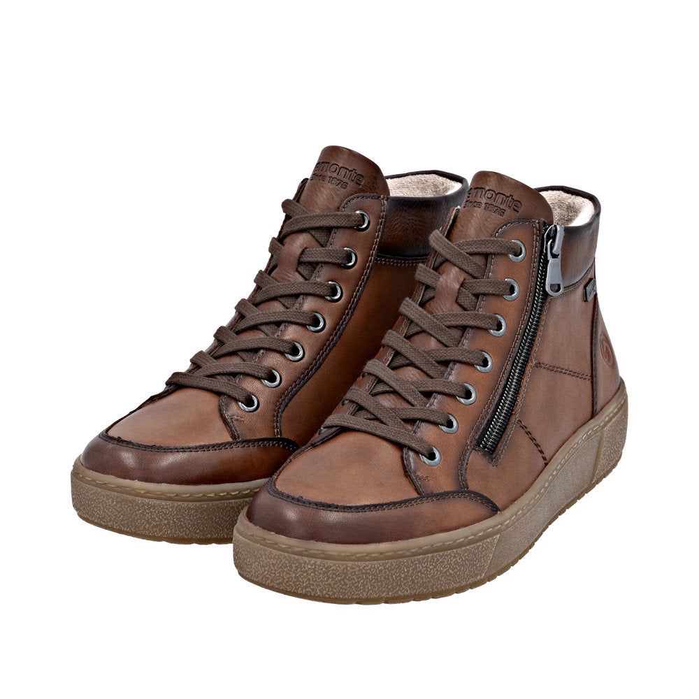 Remonte D2T70-24 women's wide brown leather waterproof ankle boots with zipper, laces, and textured sole.