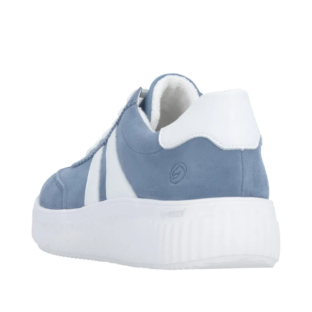 Remonte ladies wide fit blue suede lace-up sneaker with white accents and a thick white rubber sole.