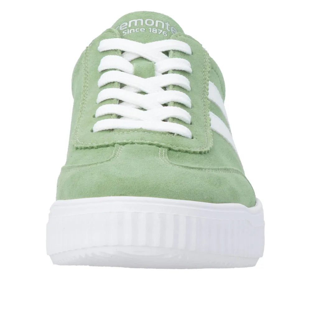 Green suede ladies wide lace-up shoes with white sole and white laces, style similar to sneakers.