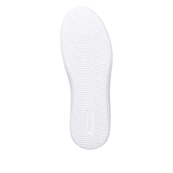 White sole of green suede lace-up shoe with textured tread design and "remonte" branding.