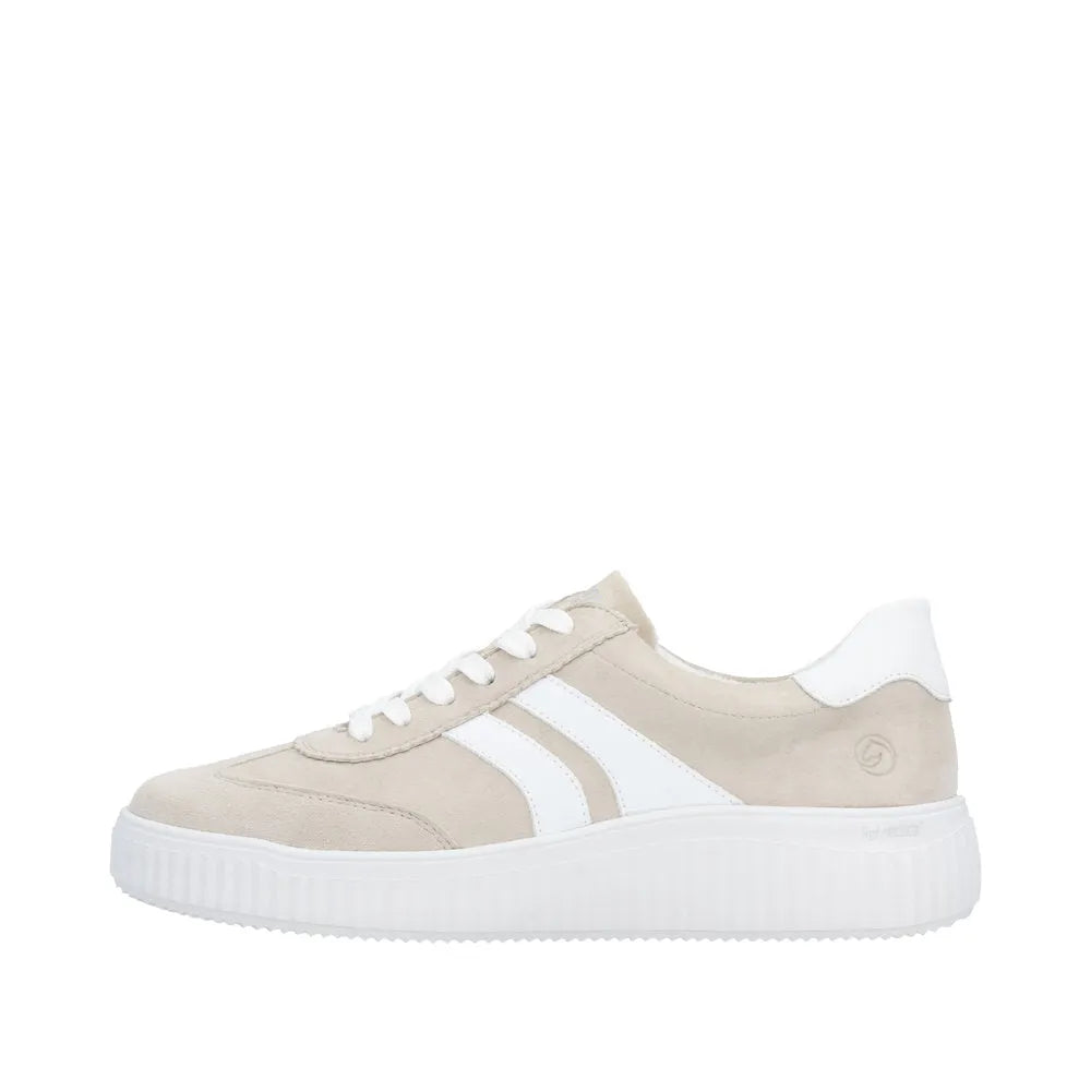 Remonte beige suede lace-up women's sneakers with white detailing and thick white rubber soles.