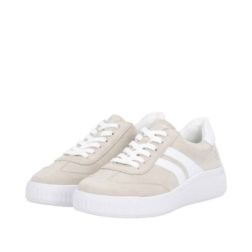 Beige suede lace-up sneakers for women with white accents, chunky rubber soles, and white laces.