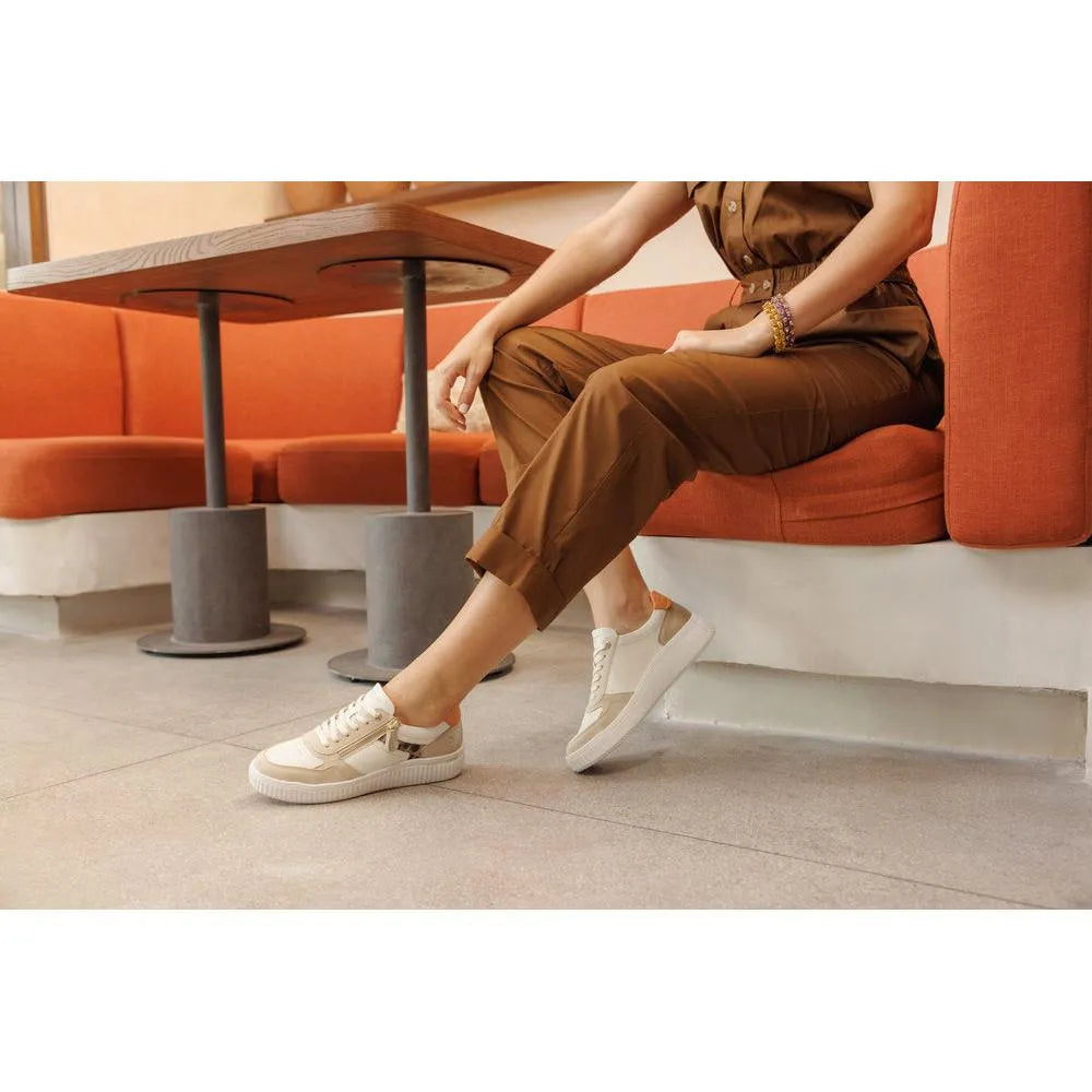 Wide, multi-colored leather zip and lace shoes in cream and beige, styled for comfort.