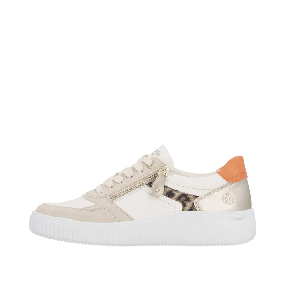 Wide multi-leather lace-up shoes with zip detail, beige tones, leopard print, and a vibrant orange heel tab.