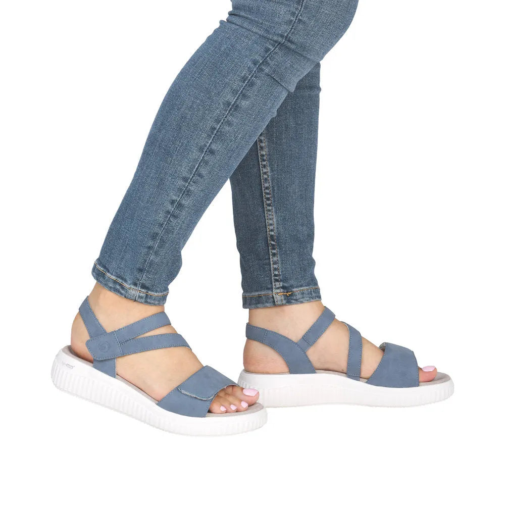 Remonte D3L51-14 women's wider indigo blue suede sandals with touch fastening straps and white rubber soles.