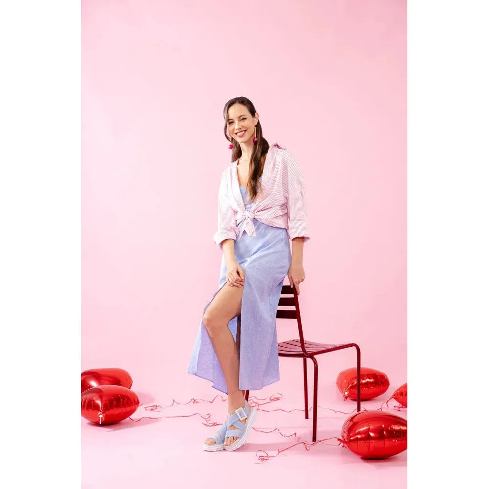 Remonte D3N51-10 ladies aqua suede touch fastening sandals with open toe design and chunky heel, styled on a model against a pink background.