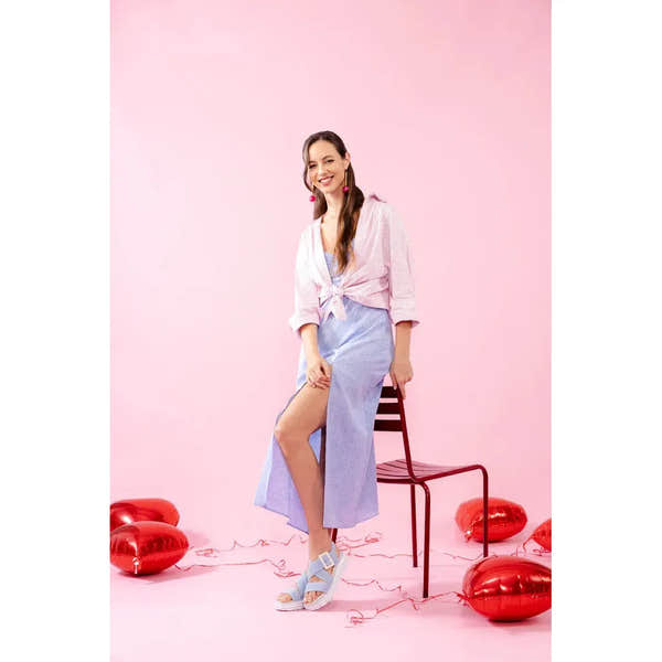 Remonte D3N51-10 ladies aqua suede touch fastening sandals with open toe design and chunky heel, styled on a model against a pink background.