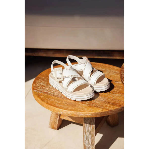 Remonte D3N51-80 women's off-white leather sandals with touch fastening and chunky sole on wooden stool.