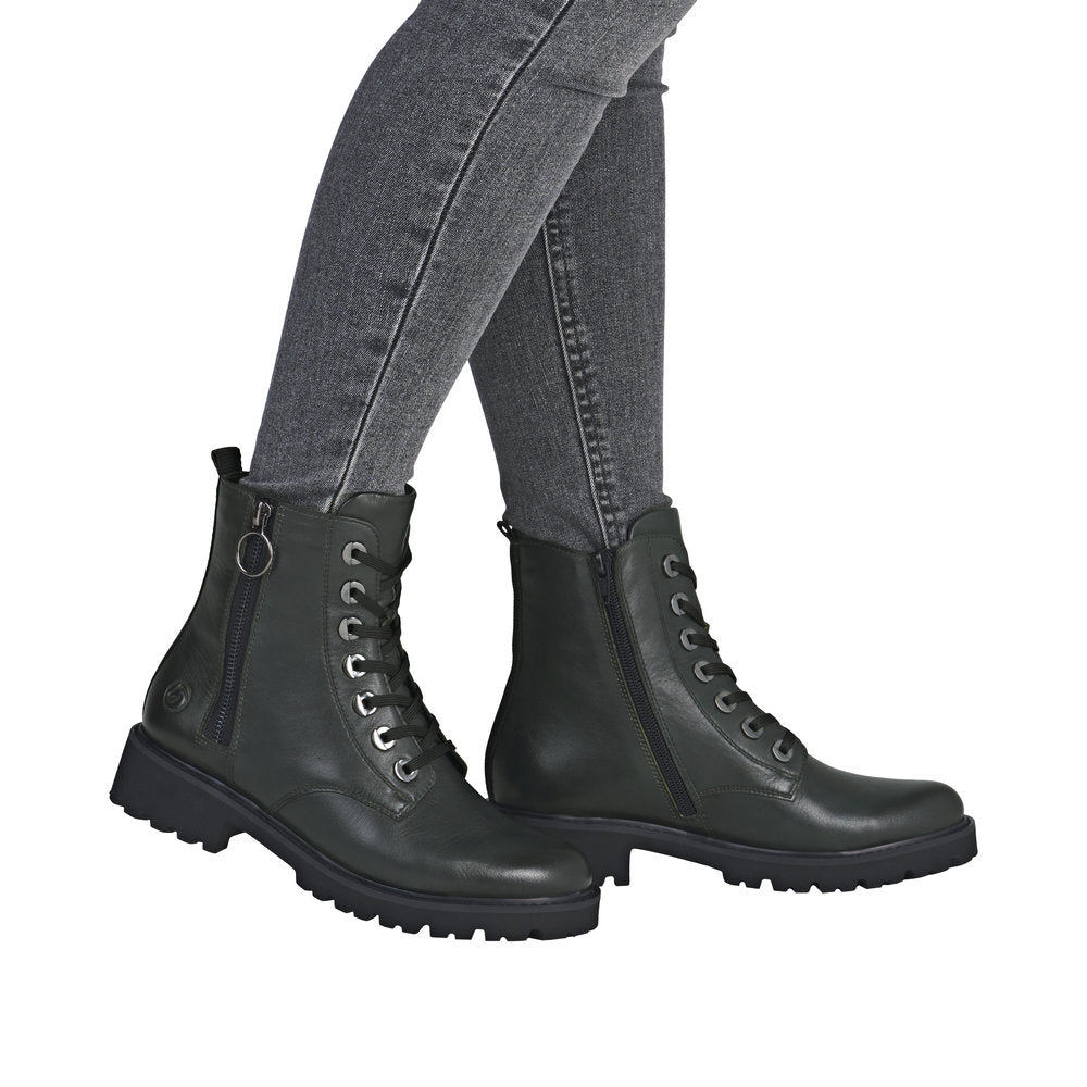 Remonte D8671-56 women's wide fit green leather ankle boots with side zippers, laces, and rugged rubber sole.