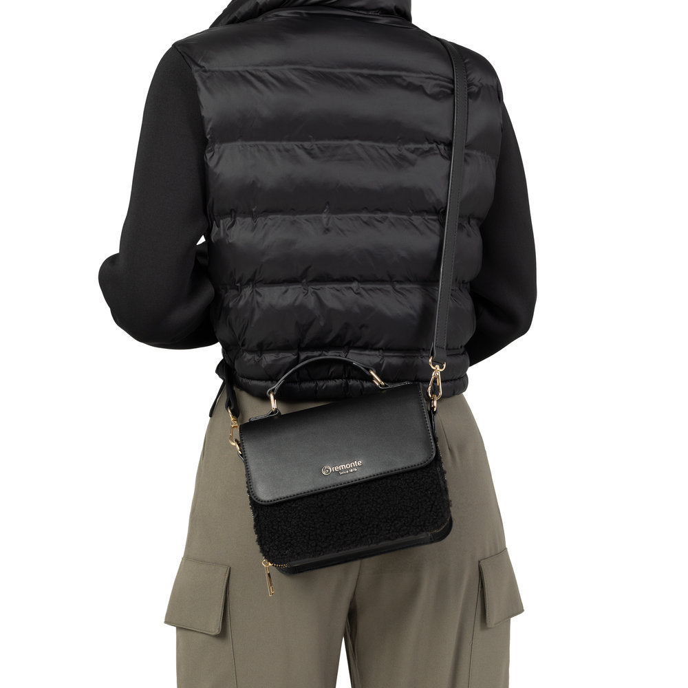 Remonte Q0632-02 black handbag with zip, shoulder strap, and mixed leather and fabric design.