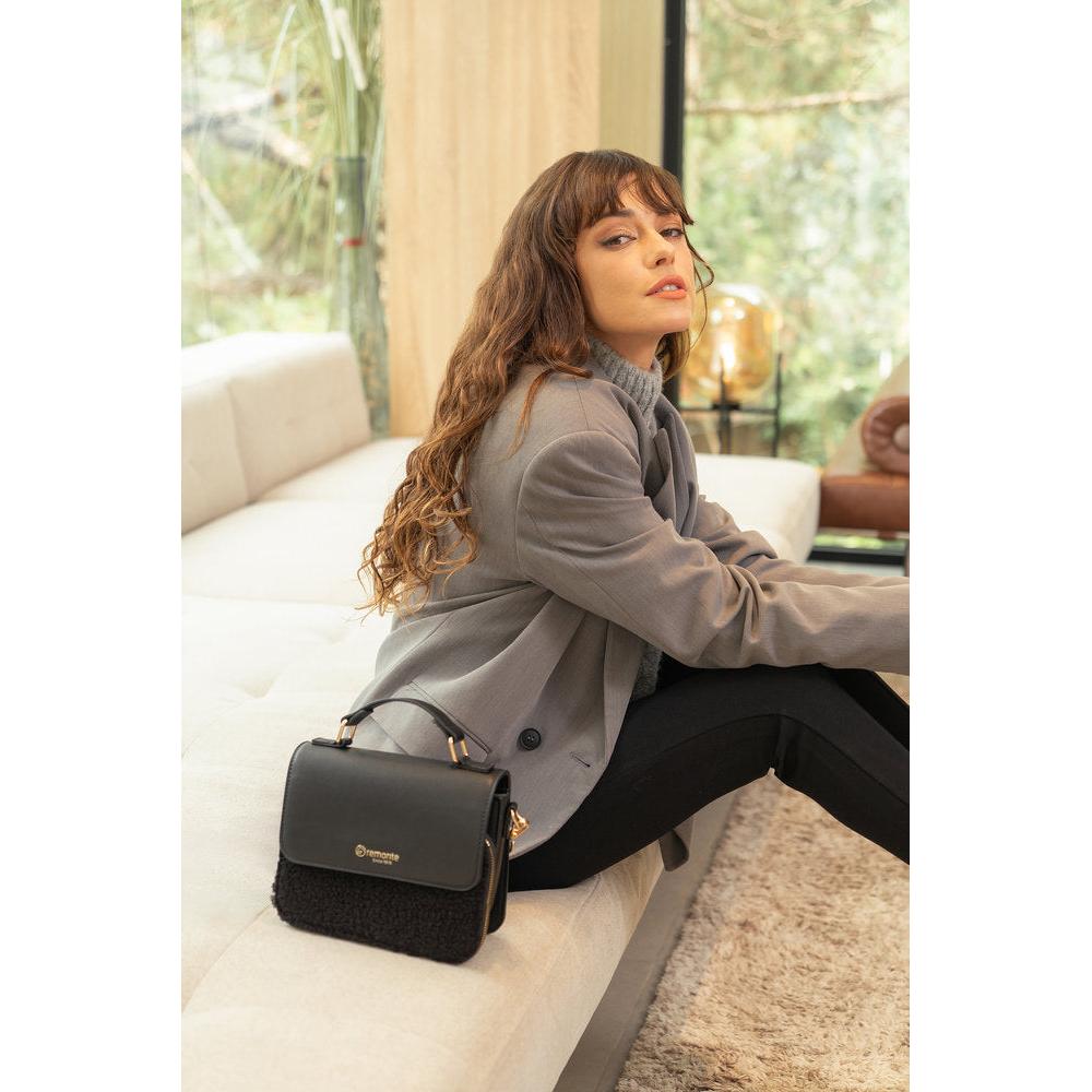 Remonte Q0632-02 Black handbag with zip, structured design, gold accents, and shoulder strap, casual fashion accessory.