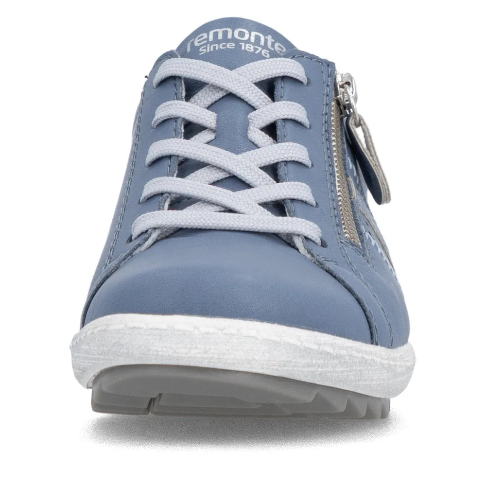 Blue leather women's wide-fit sneaker with white laces, side zipper, and casual style.