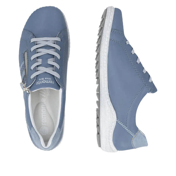 Blue leather ladies' shoes with zip and lace-up closure, white sole, and stitching detail.