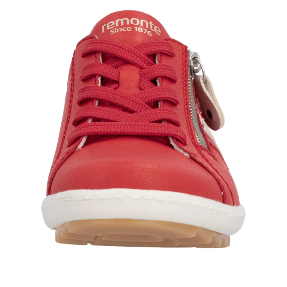 Red leather women's sneaker with lace-up front and side zipper, white sole, and branded logo on the tongue.