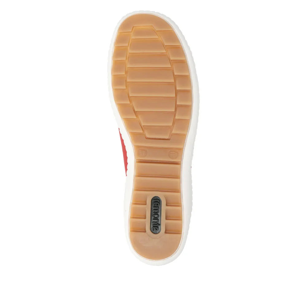Red leather women's shoes with zip and lace, featuring a tan rubber sole with traction pattern.