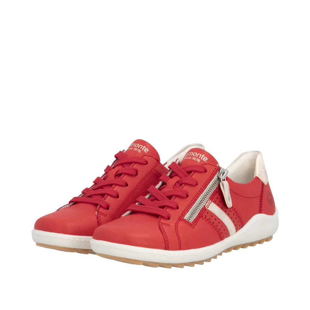 Red leather ladies' shoes with laces and side zipper, white accents, cushioned sole, and beige outsole.