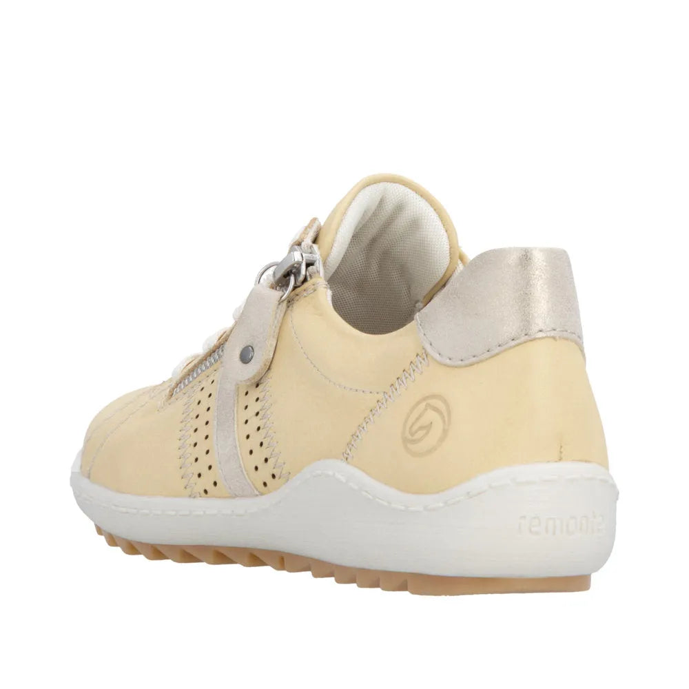 Remonte R1432-69 women's yellow leather sneakers with zip and lace closure, featuring a white sole and silver accents.