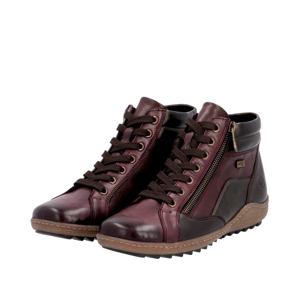 Remonte R1458-35 women's wide fit brown water-resistant ankle boots with zip & lace-up design, lightweight sole, and stylish finish.