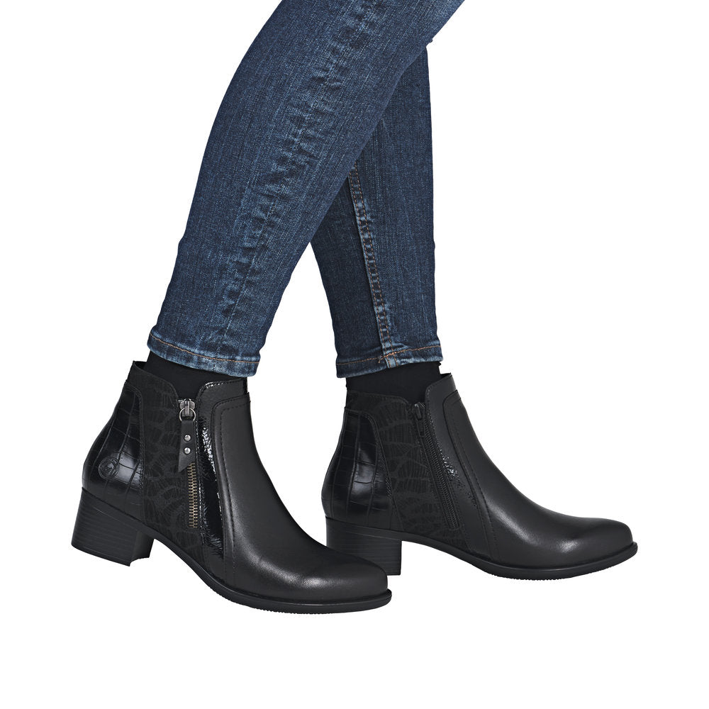 Remonte R5172-00 women's black ankle boots with side zipper, low block heel, and textured details, perfect for stylish everyday wear.