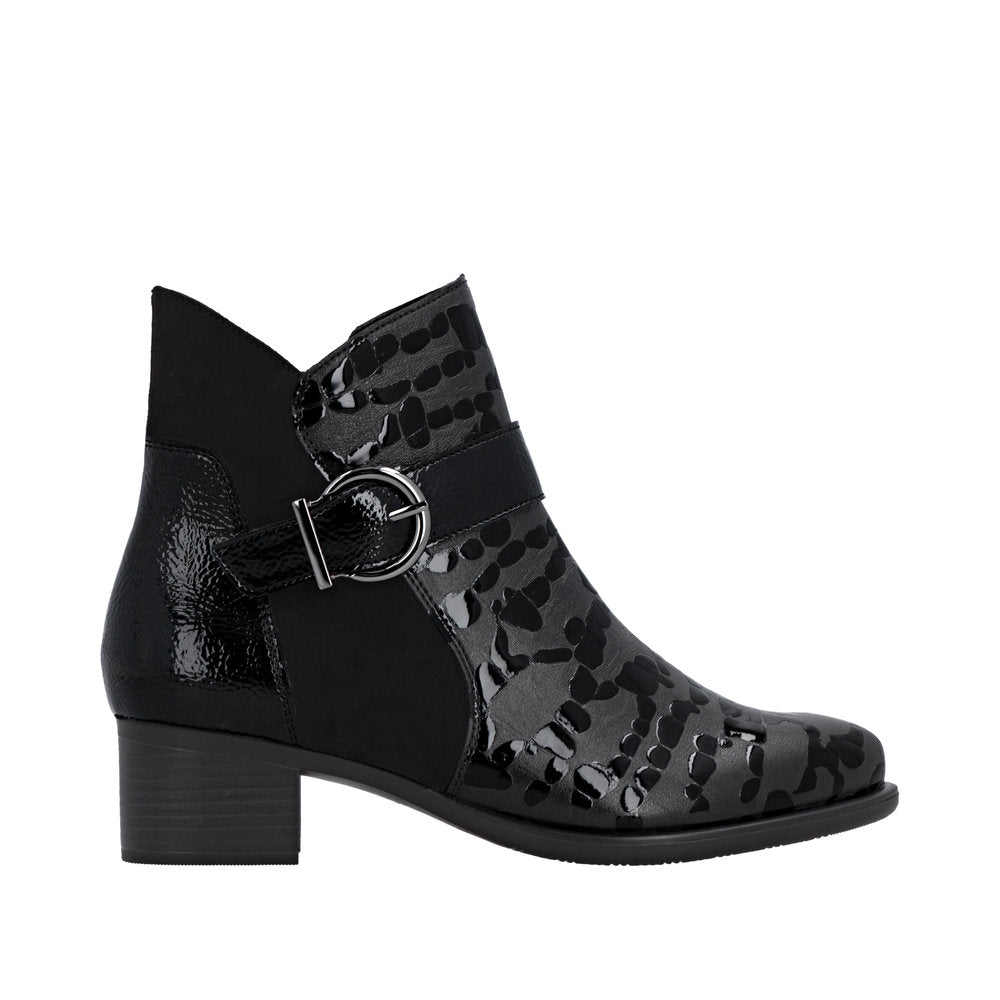 Remonte R5188-02 women's black patent leather ankle boots with side zip, rounded toe, chunky heel, and decorative strap with silver buckle.